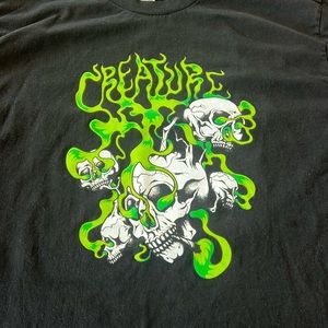 Men’s Largs Creature Tee. New condition Val Surf. Neon green/black Skull